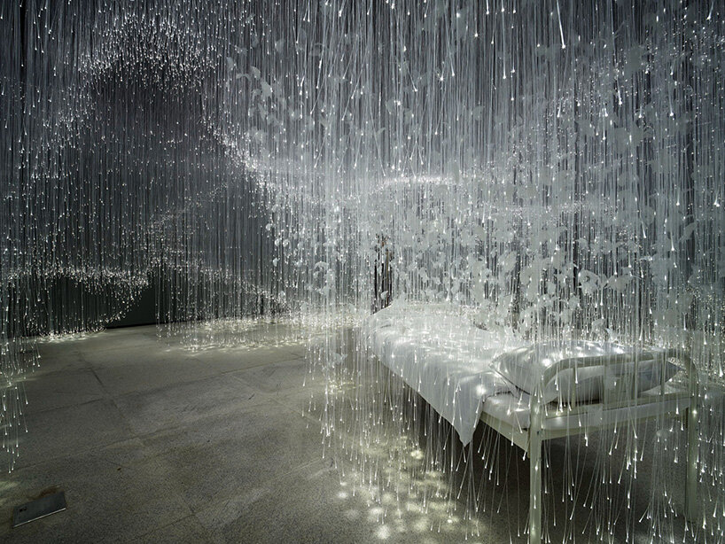 chiharu shiota suspends butterfly wings over warm bed at beijing’s red brick art museum post thumbnail image