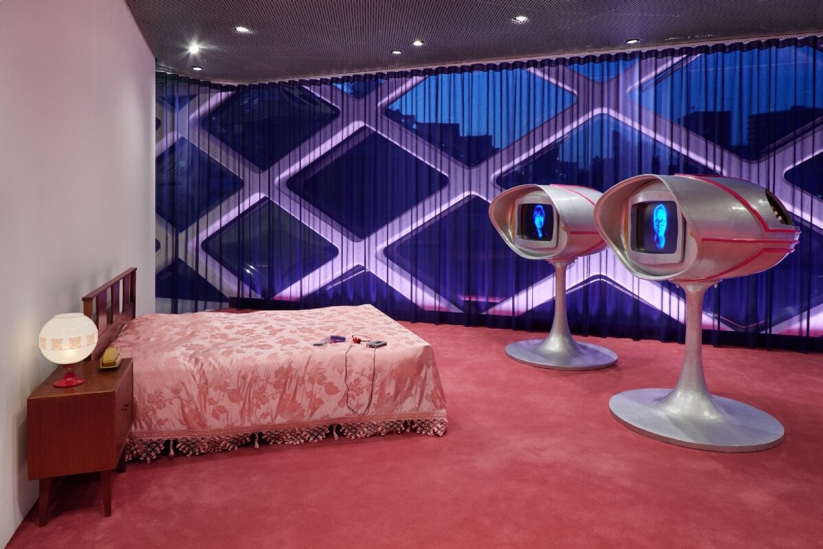 nicolas winding refn & hideo kojima craft retro-futuristic digital world at prada aoyama, tokyo post thumbnail image