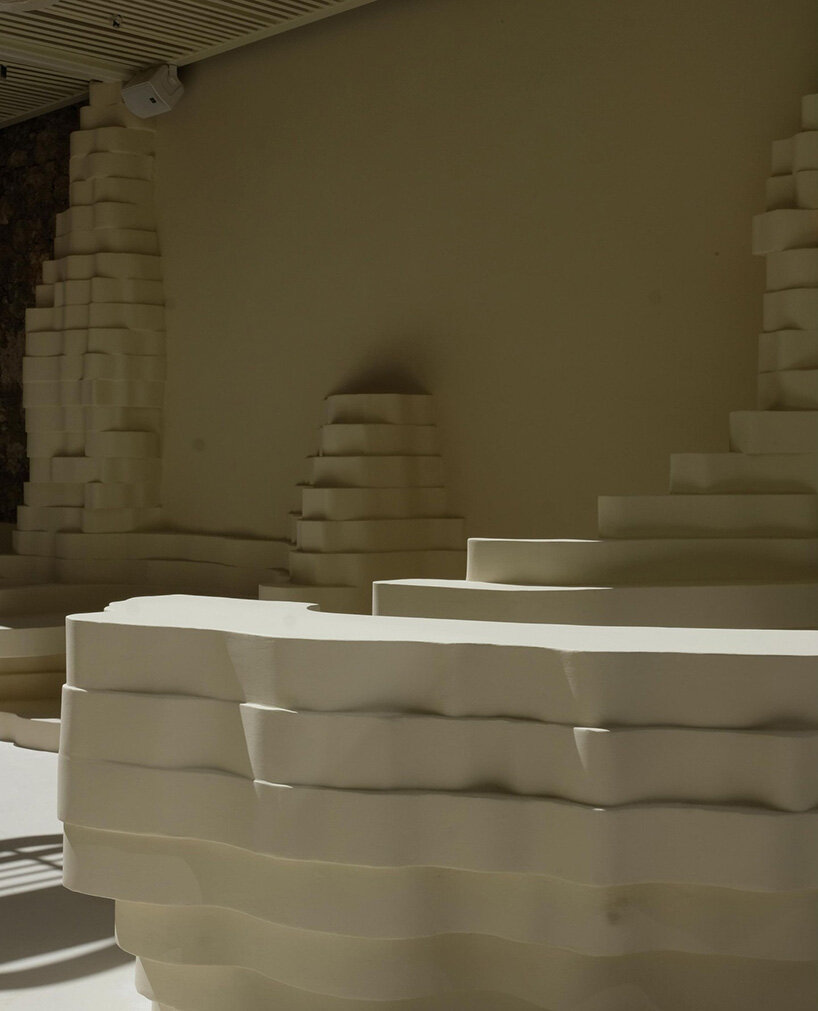 snarkitecture’s burger bar takes form in athens with creamy, canyon-like interiors post thumbnail image