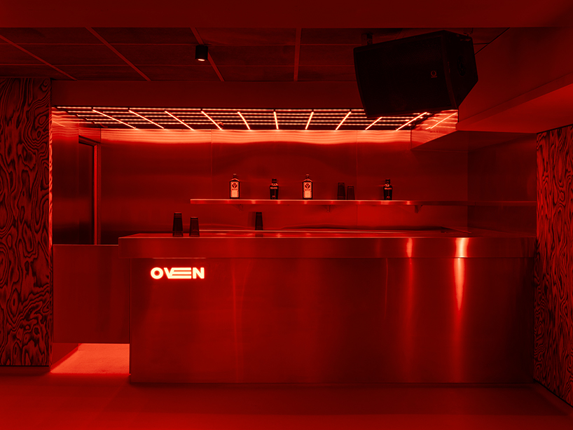 clap studio renovates valencia’s oven club with red-hot interiors and kinetic light grids post thumbnail image