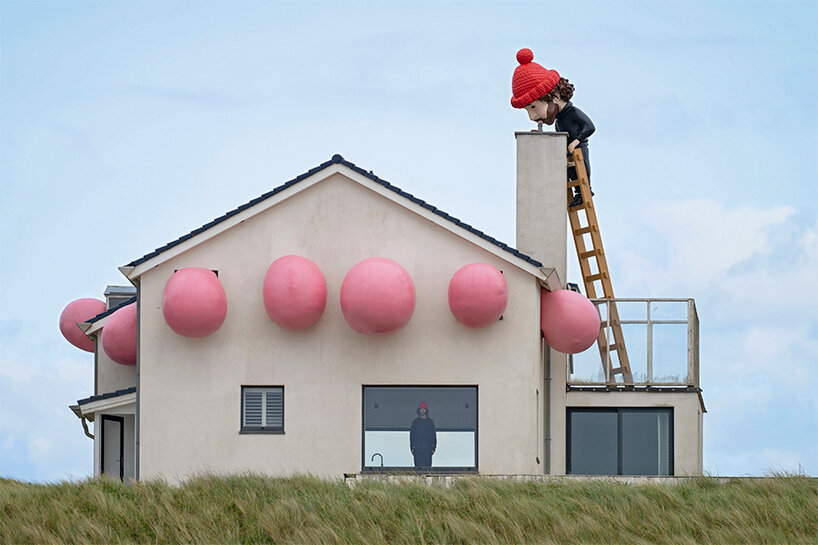 frankey blows giant bubble that breaks through windows in latest rooftop sculpture post thumbnail image