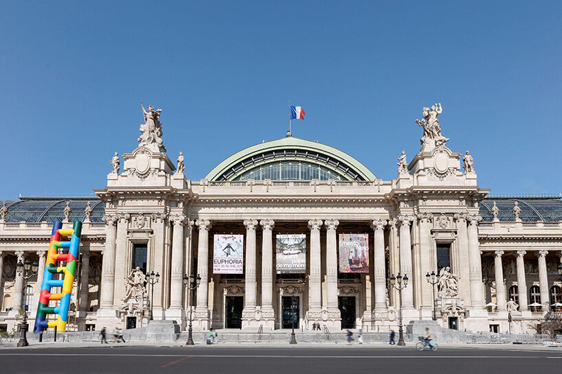 paola pivi leans 20-meter technicolor ladder against the grand palais in paris post thumbnail image