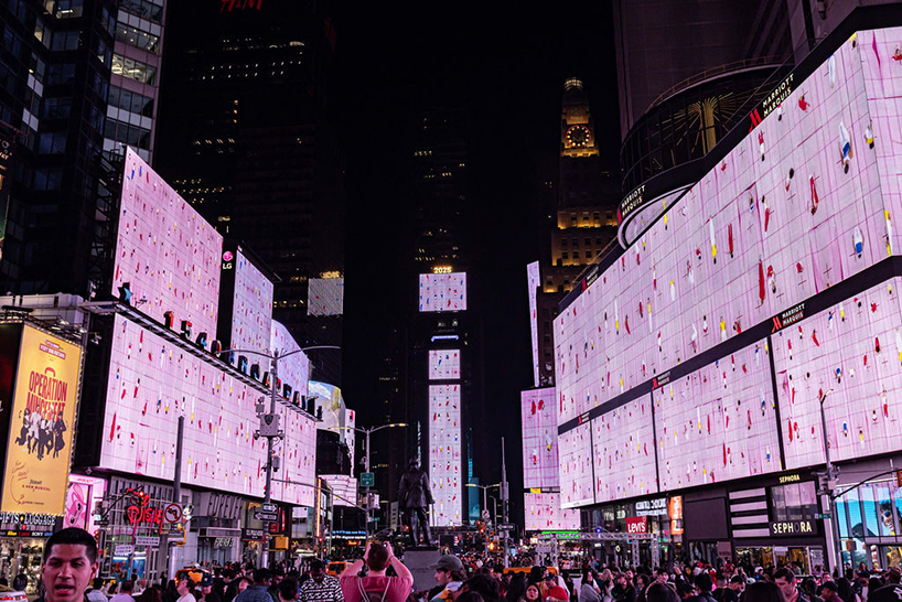 leaping olympic gymnasts form shifting colorfield in yuge zhou’s NYC times square takeover post thumbnail image